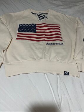 DC Comics Cream Crewneck Sweatshirt with Flag and Superman Script